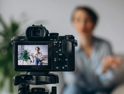 young-woman-blogger-recording-video-camera